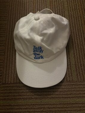 White Baseball Cap with Blue "Talk Away the Dark" Embroidery